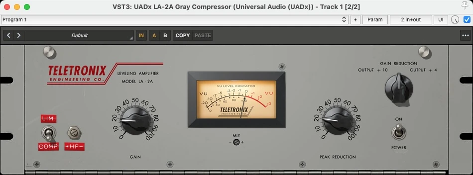 A screenshot of the Universal Audio LA-2A plugin. The plugin has a new default preset loaded where the output volume has been lowered to avoid being tricked by louder sounding better. LA-2A with new default setting